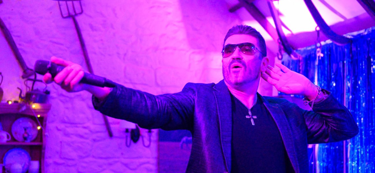 Andrew Browning as George Michael performing at The White Horse Inn